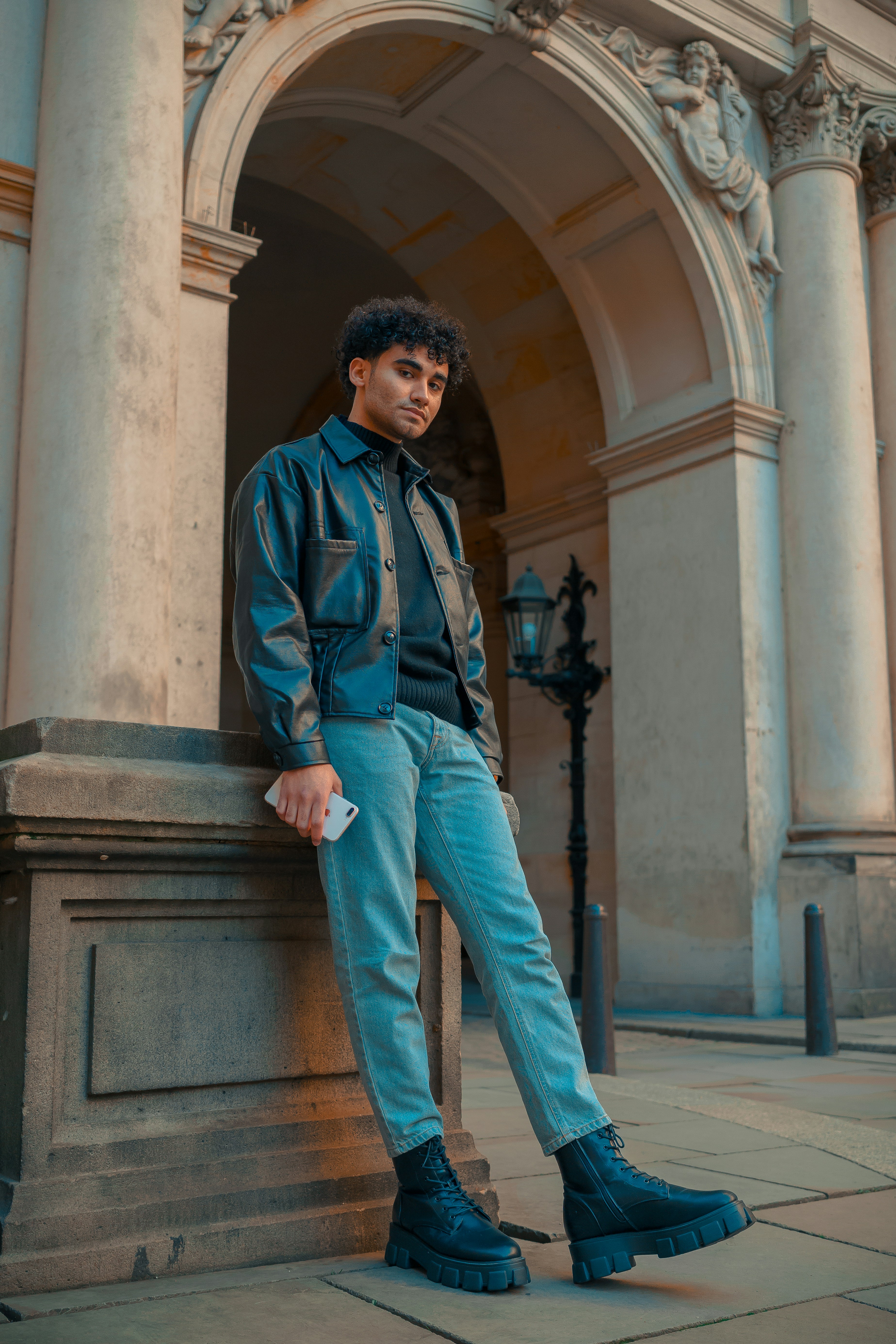 a person standing in front of a building