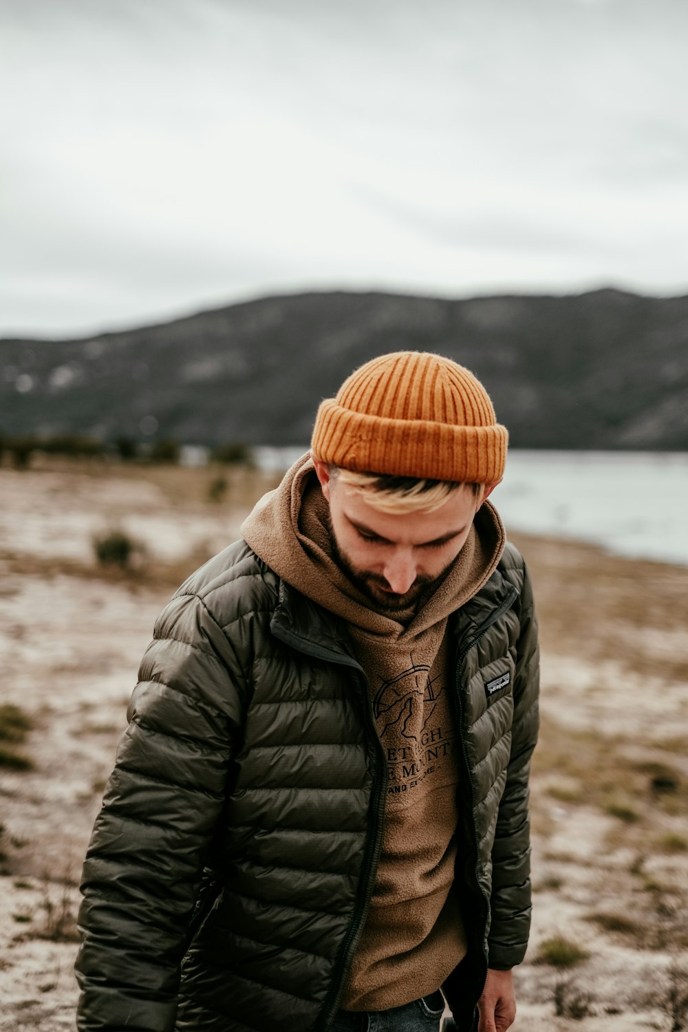 a person wearing a hat and scarf