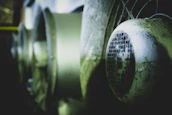 Close-up of drying fans and dehumidifiers in action during mold prevention in a basement.