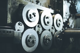 Gallery of metal components representing mining and food industry sectors.