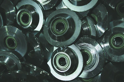 Stack of finished gears ready for quality inspection.