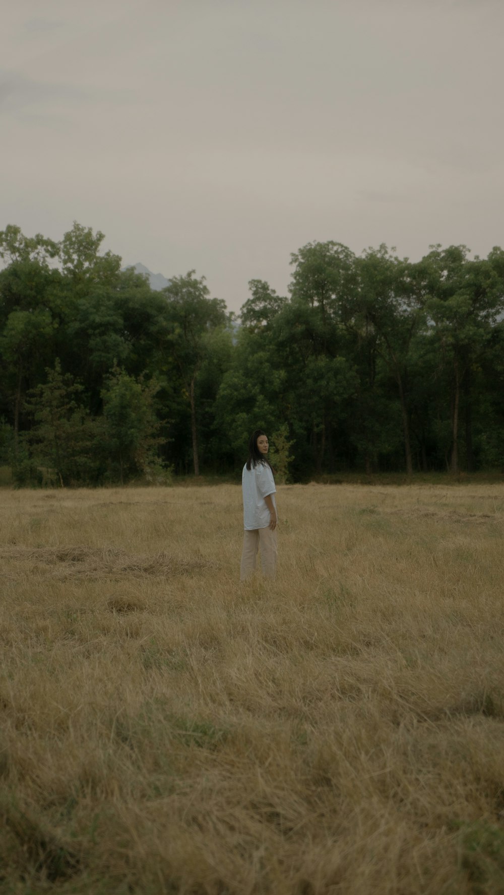 a man standing in a field