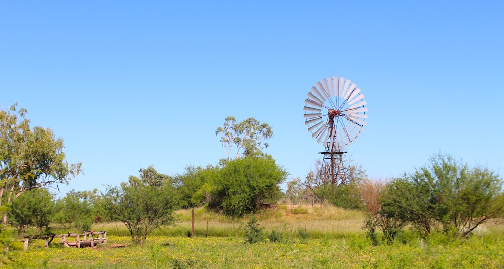 a large windmill in a field