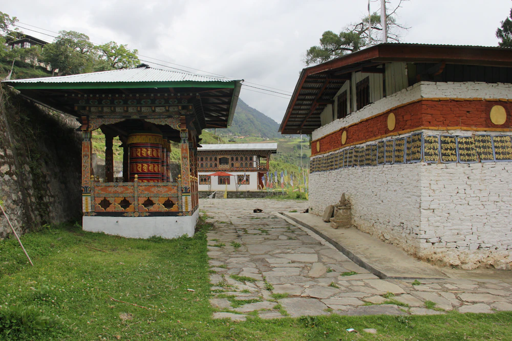Stone pathway leading to a Bhutanese temple