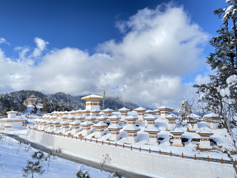 a building with many umbrellas in the snow