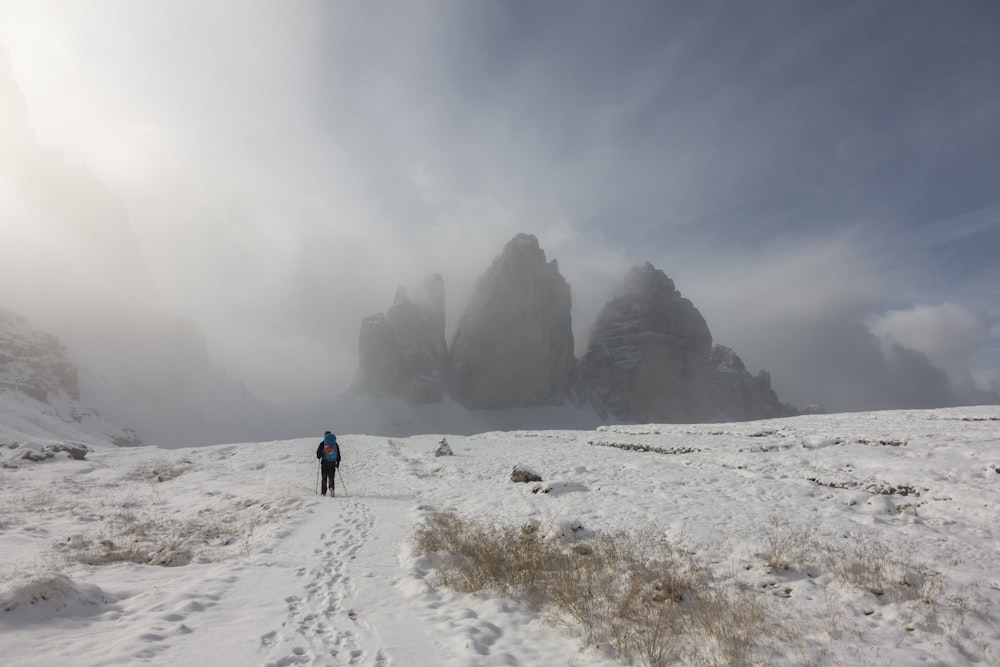 a person walking on a snowy path