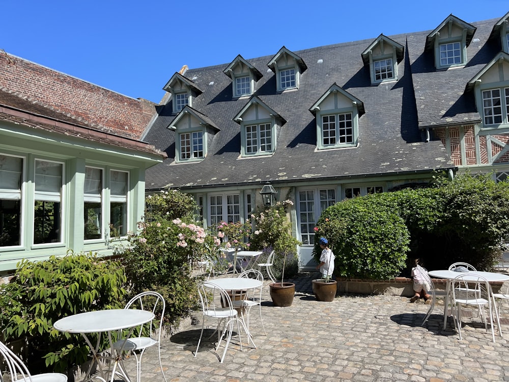 a house with a patio and chairs