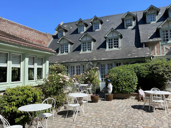 a house with a patio and chairs