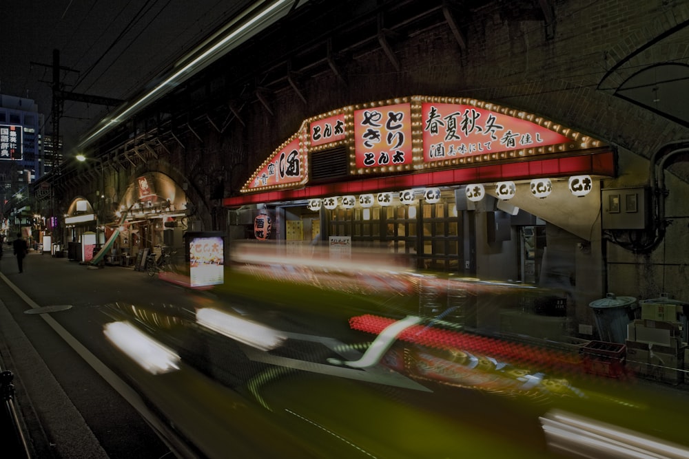 a train passing by a building