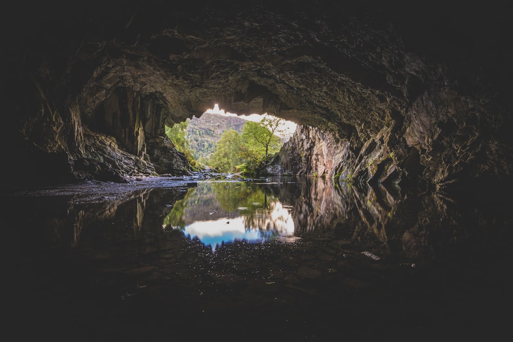 a cave with a body of water in it