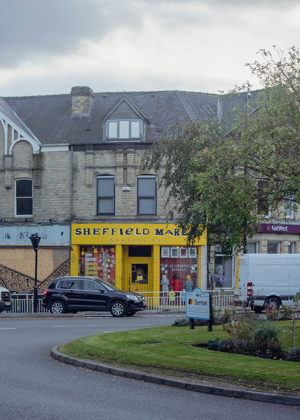 a building with a yellow sign