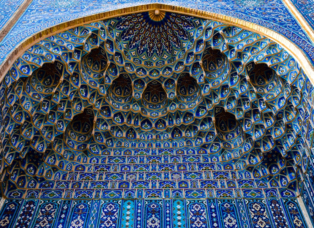 a domed ceiling with many intricate designs