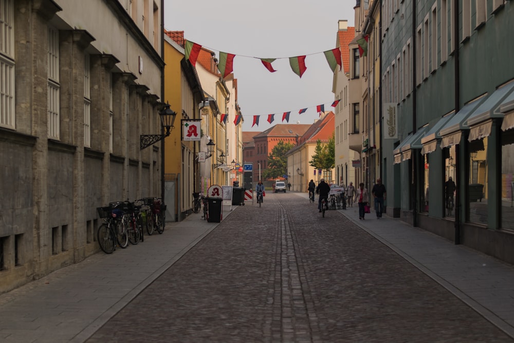 a street with people and bikes on it