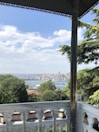 A stunning view from the hotel room balcony overlooking the city.