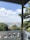 A scenic view from a balcony overlooking the city skyline.