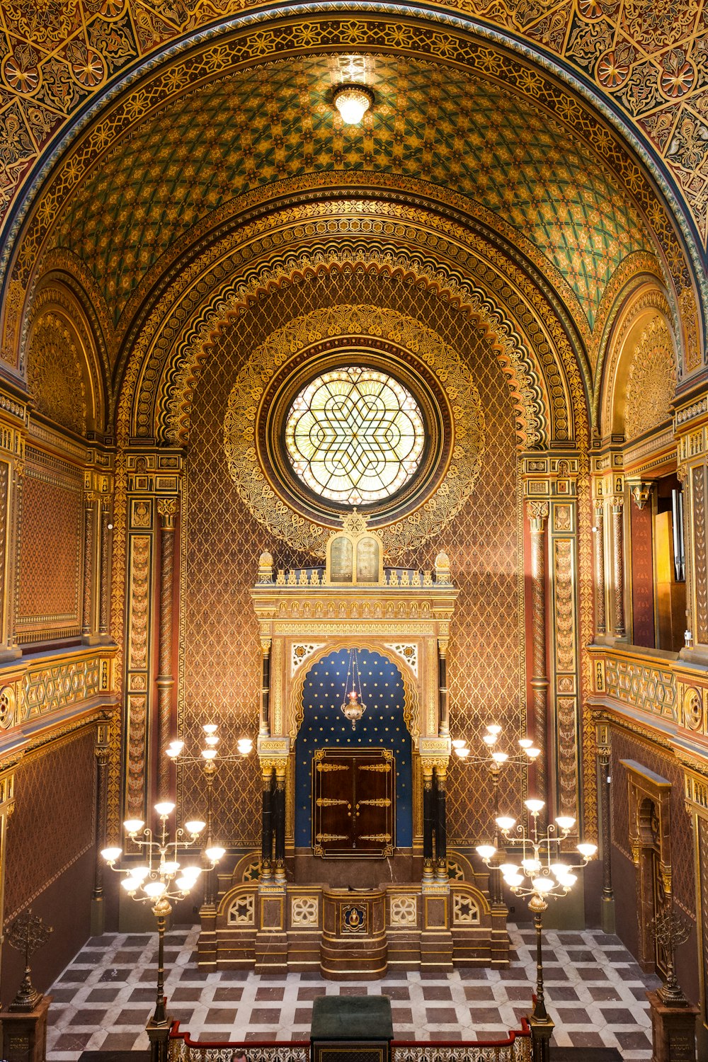 a large ornate room with a large arched ceiling