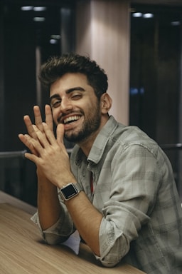 photography poses for men,how to photograph a man smiling and holding his hands up