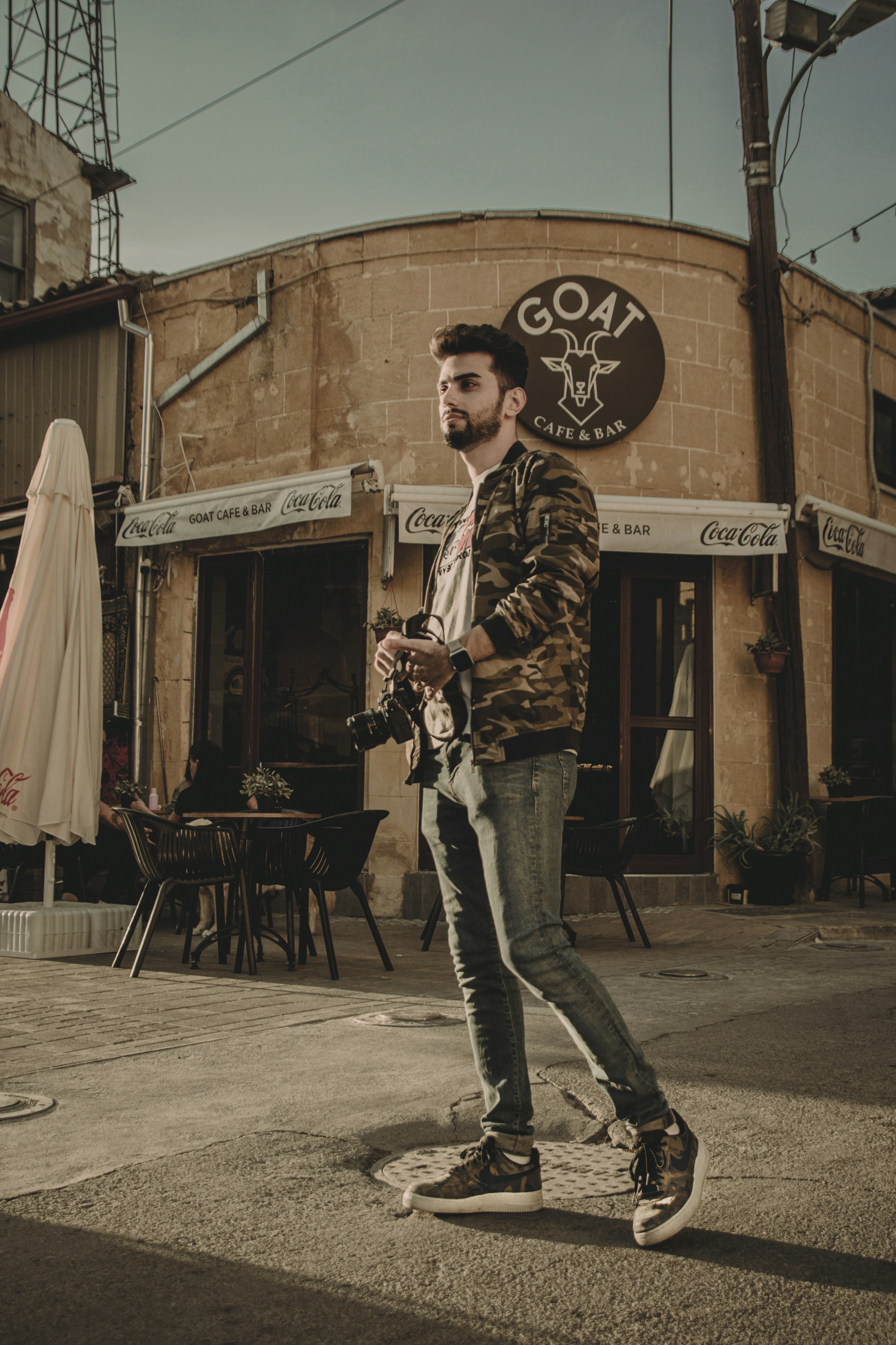 a man holding a camera