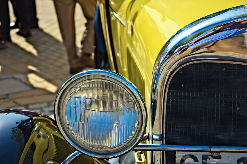 a close up of a yellow car