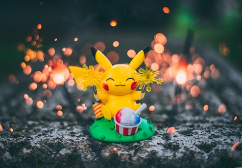 a small toy on a rock