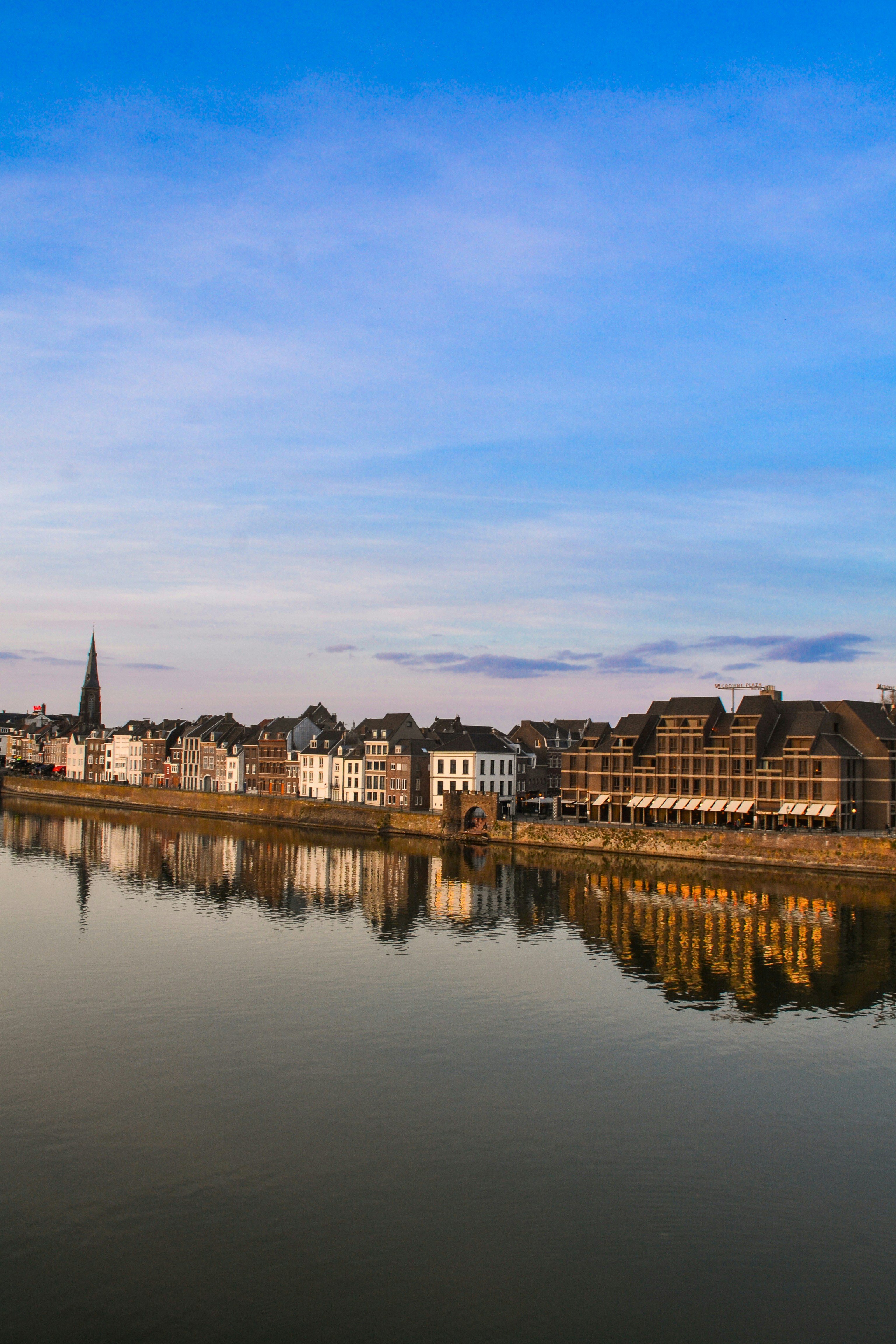 a body of water with buildings along it