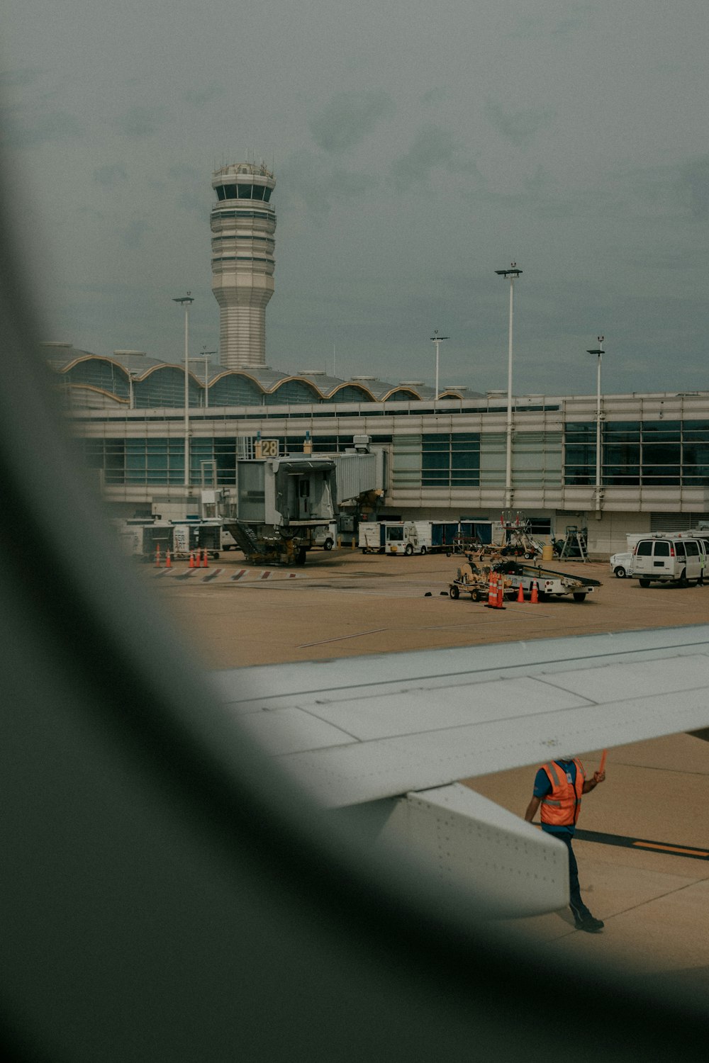 a plane with a tower in the background