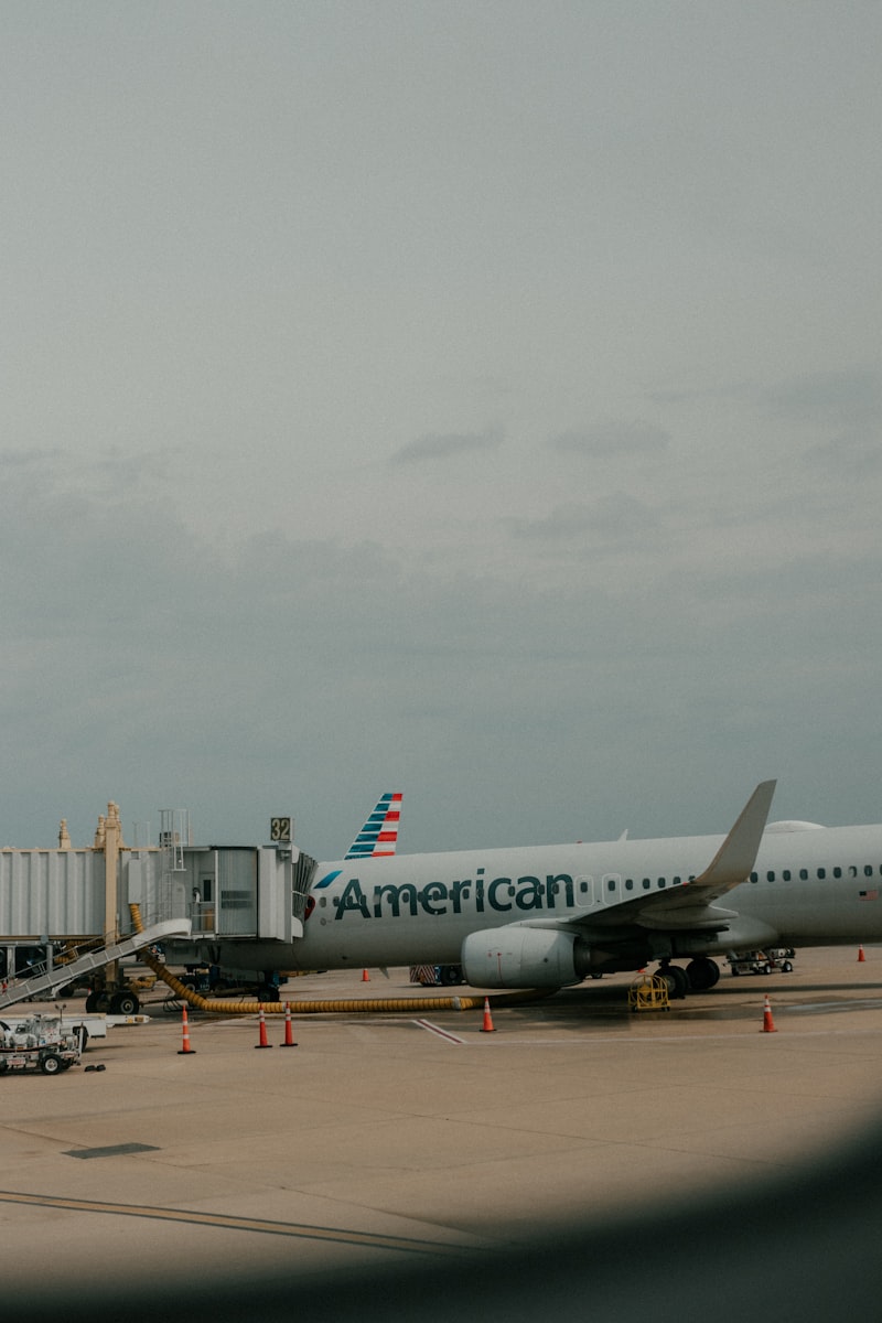 An American Airlines airplane parked at an airport gate