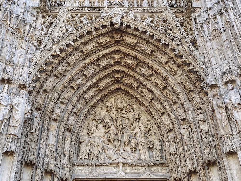 a large ornate building with statues