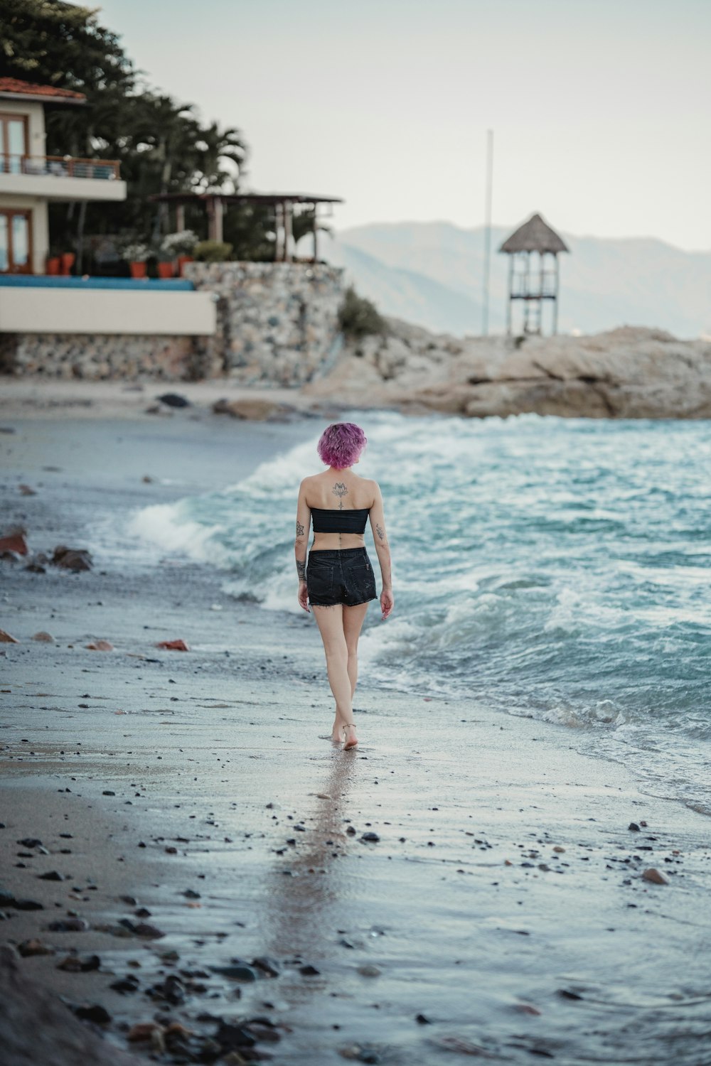 a person walking on a beach