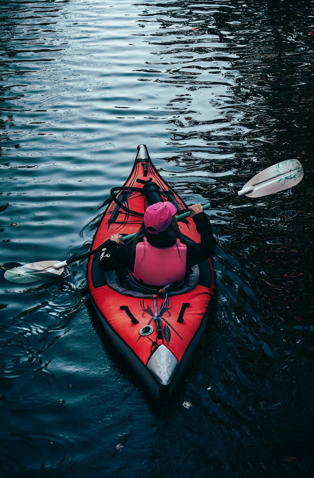 a person in a kayak in the water