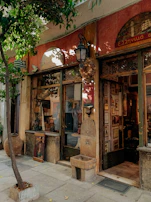 A serene shot of trayam boutique’s storefront adorned with traditional floral decorations.