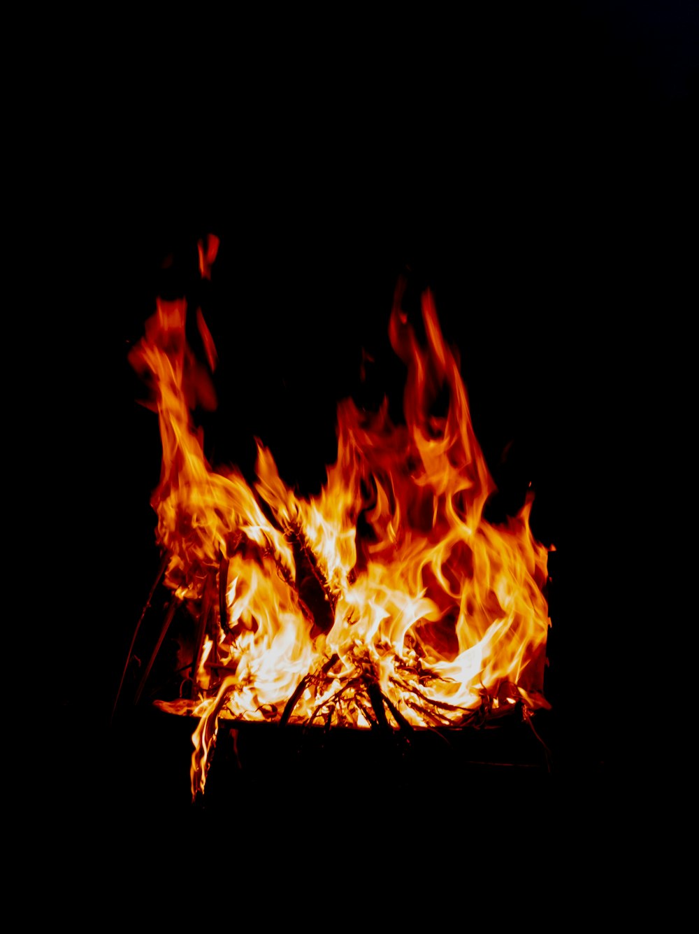 a fire burning in a fireplace