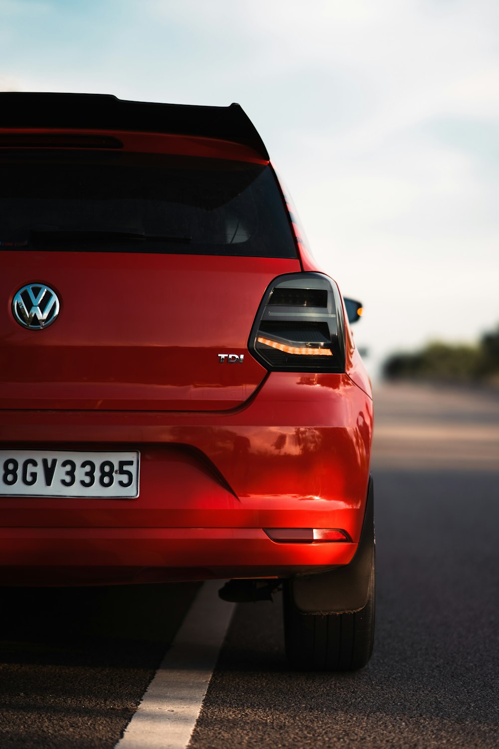 The back of a red car photo – Free Volkswagen polo Image on Unsplash