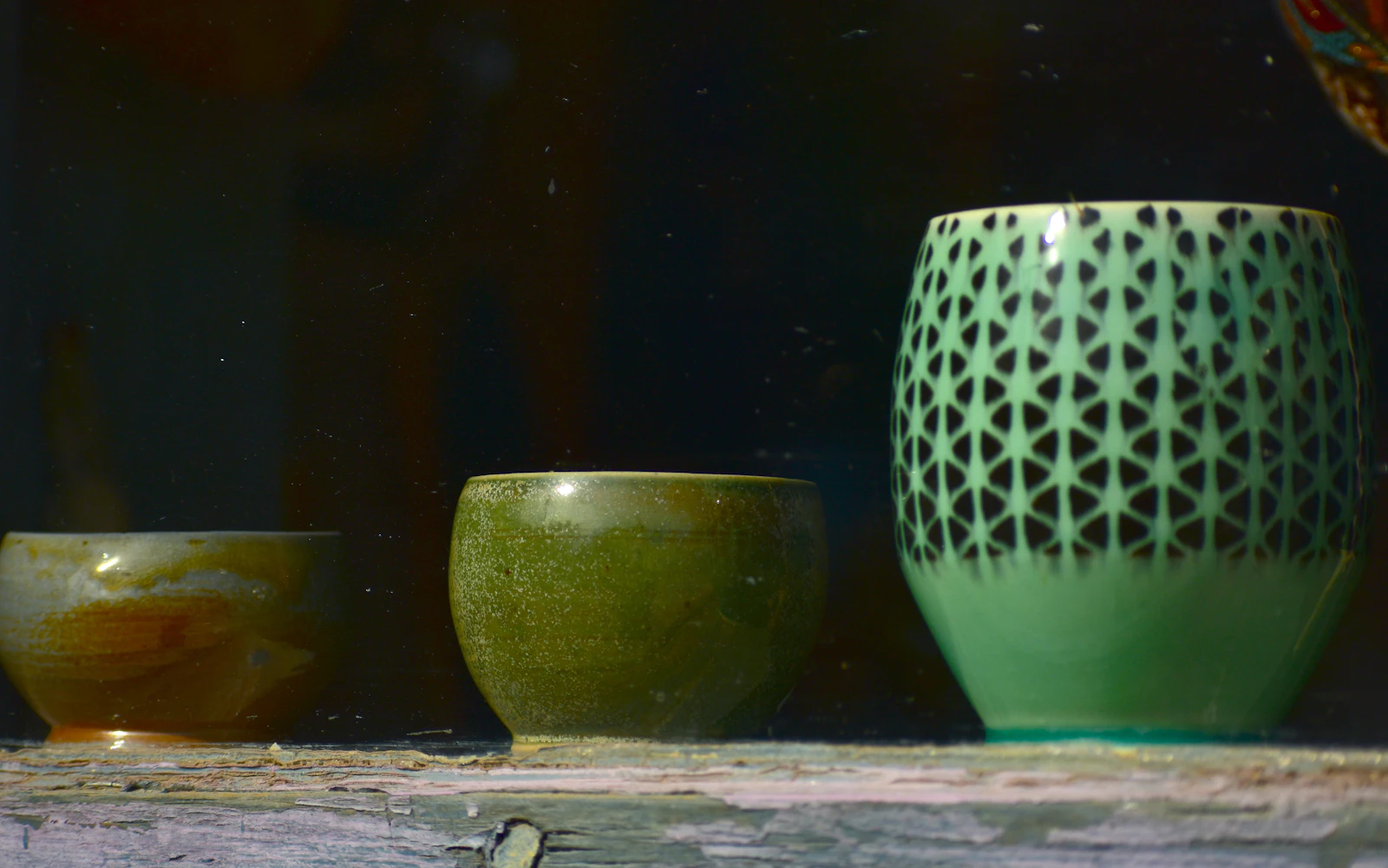 Hand-painted talavera ceramics drying in a workshop