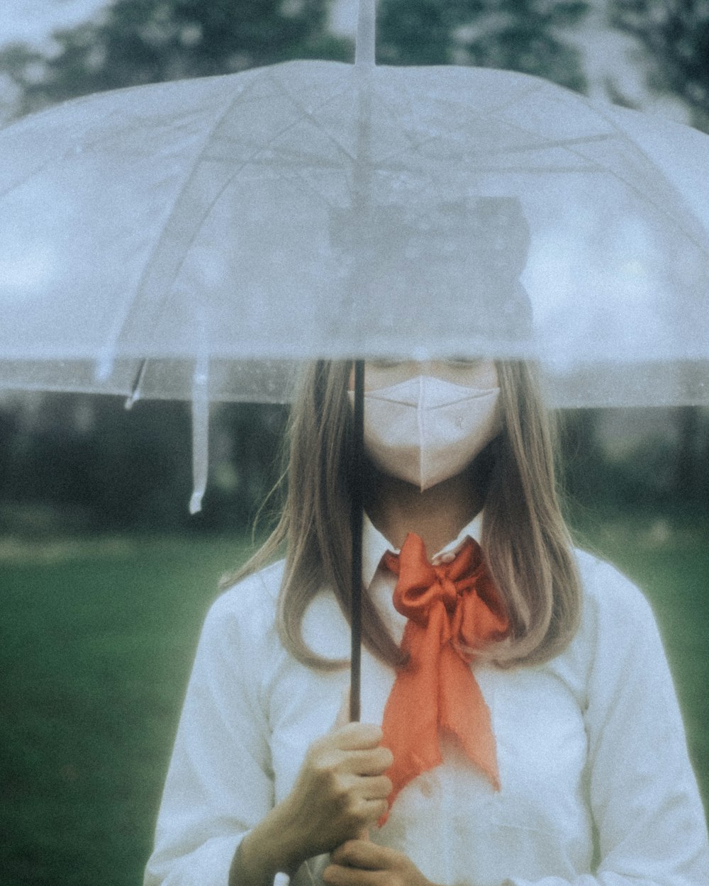 a woman with a mask and a white mask