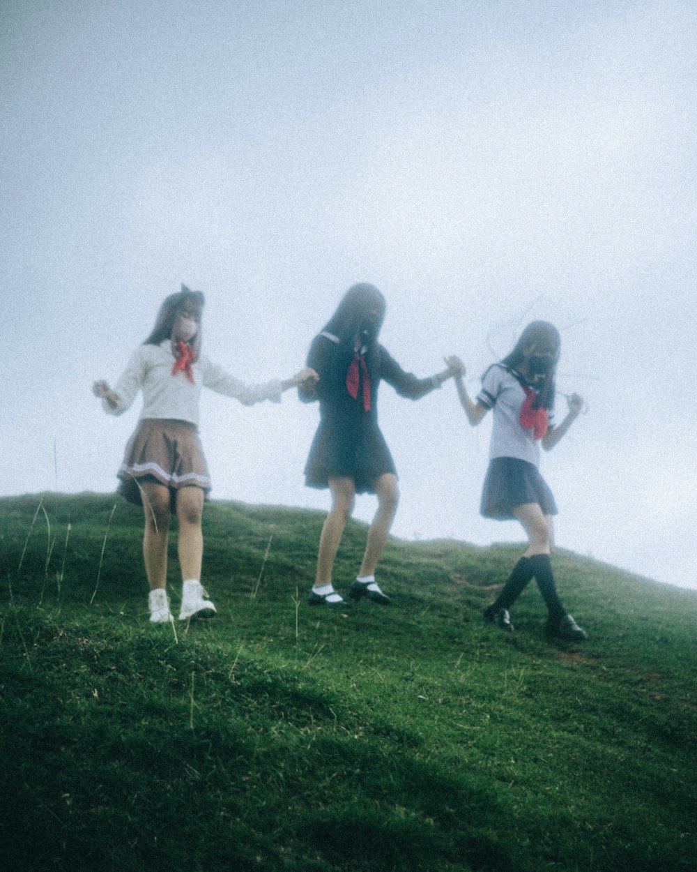 a group of girls in a field