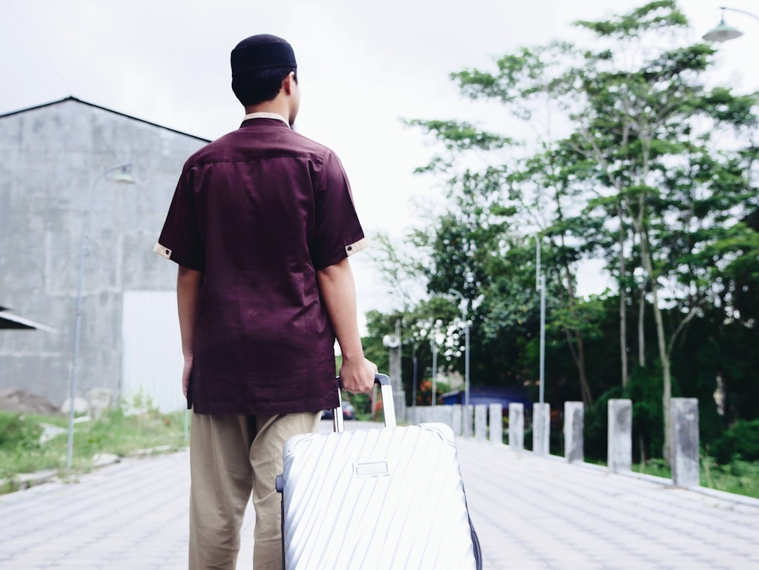 a man carrying a briefcase,