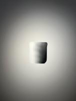 Minimalist product shot featuring a sleek item on a neutral background.