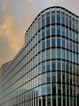 Contemporary commercial building featuring glass and steel.
