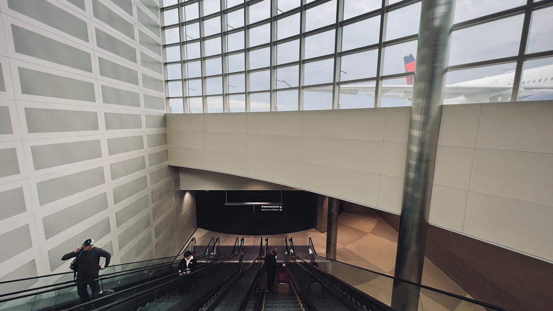 a person walking up a staircase, Carried down.