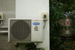 a white box with a vent
