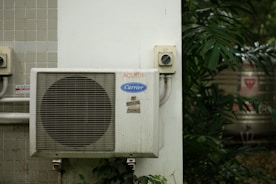 a white box with a vent