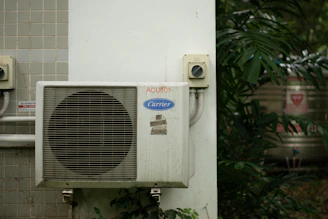 a white box with a vent
