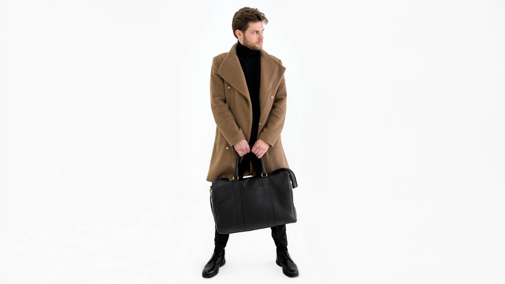 a man in a brown coat