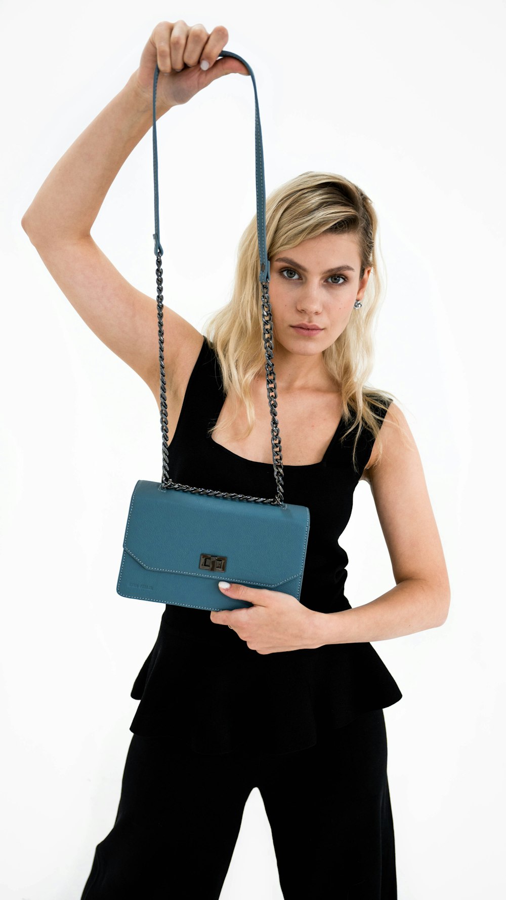 a woman holding a briefcase