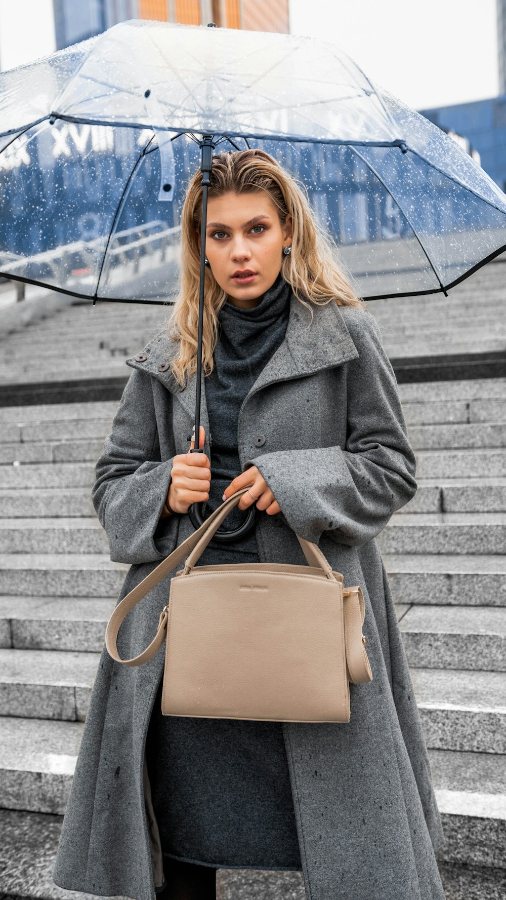 a woman holding an umbrella