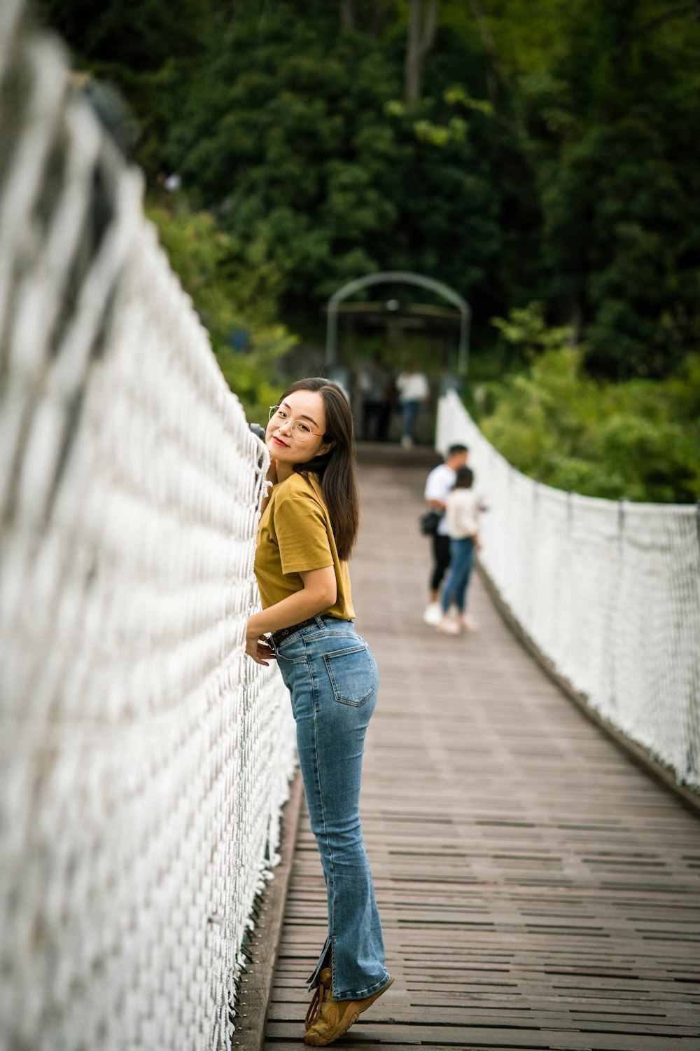 a person standing on a bridge