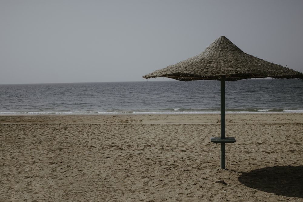 an umbrella on a beach