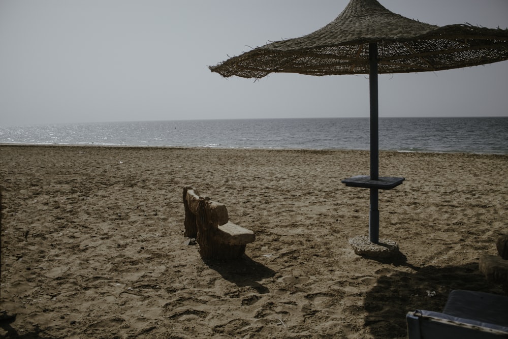 a couple umbrellas on a beach