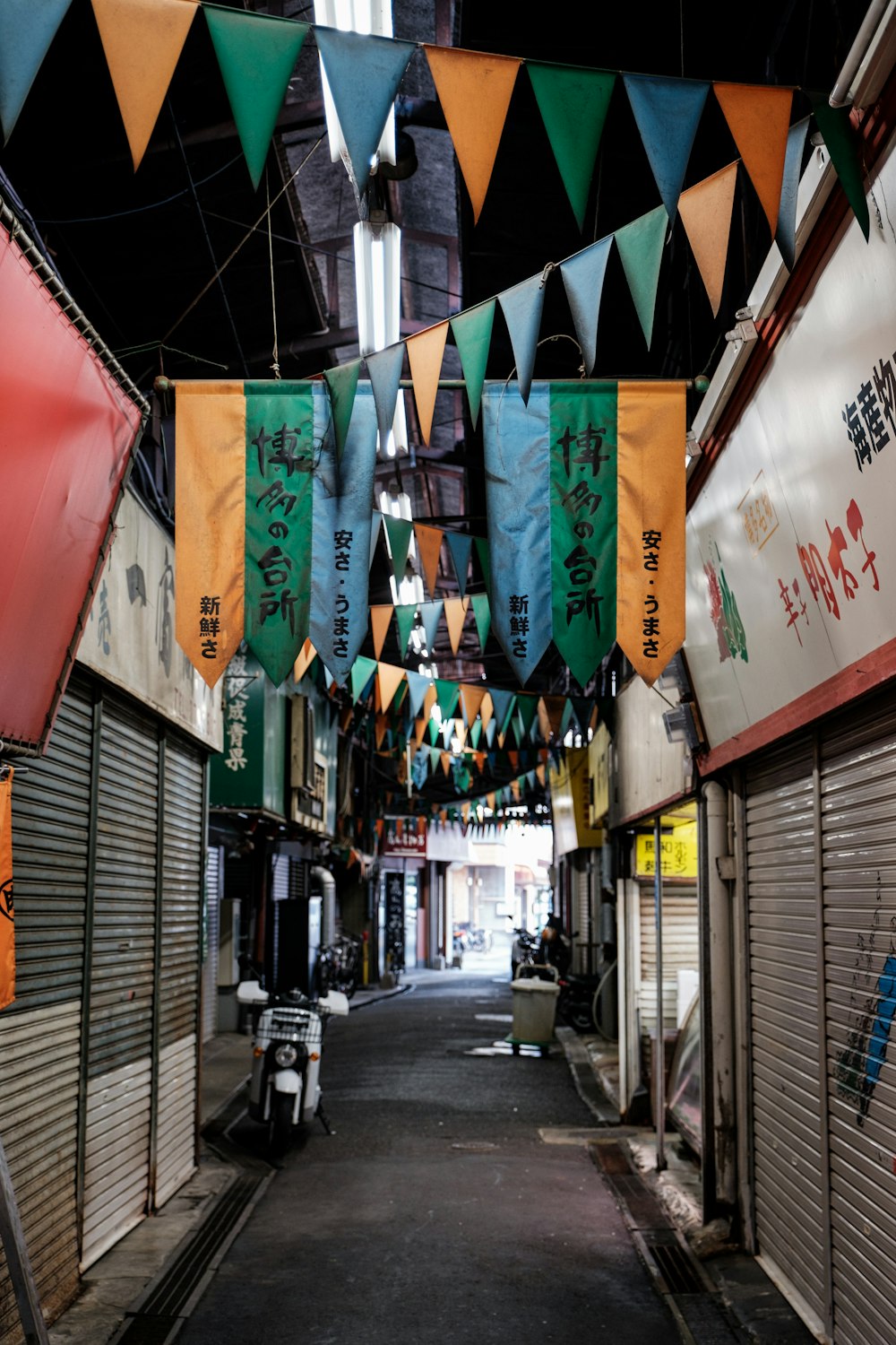 a street is filled with flags